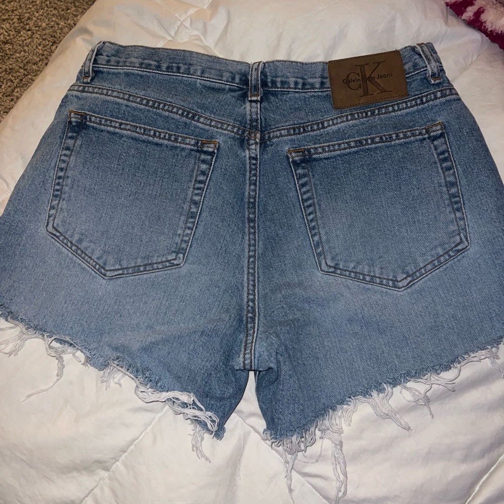 Calvin Klein denim cutoffs size 31